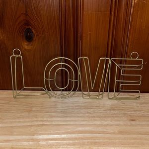 NEVER USED - Gold metal- love sign